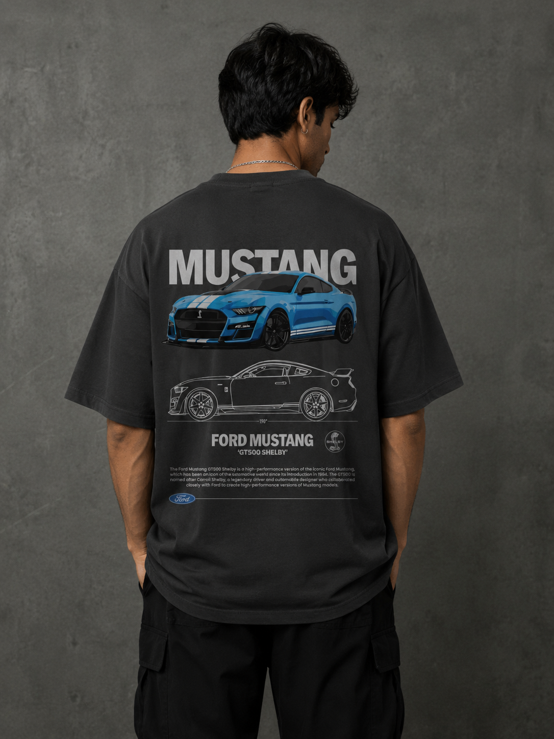 Model wearing dark Mustang Shelby oversized t-shirt with cobra-style front graphic by Snitch Glitch